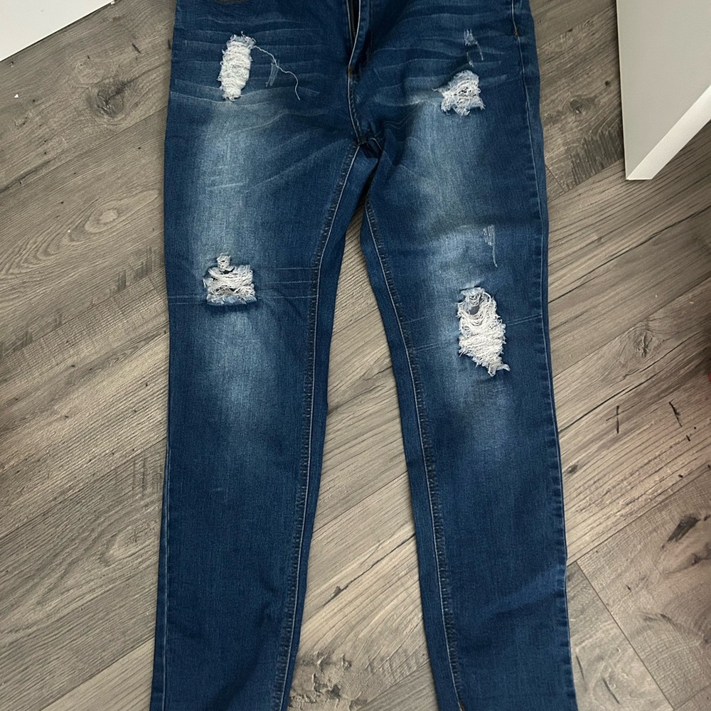 Distressed Blue Jeans